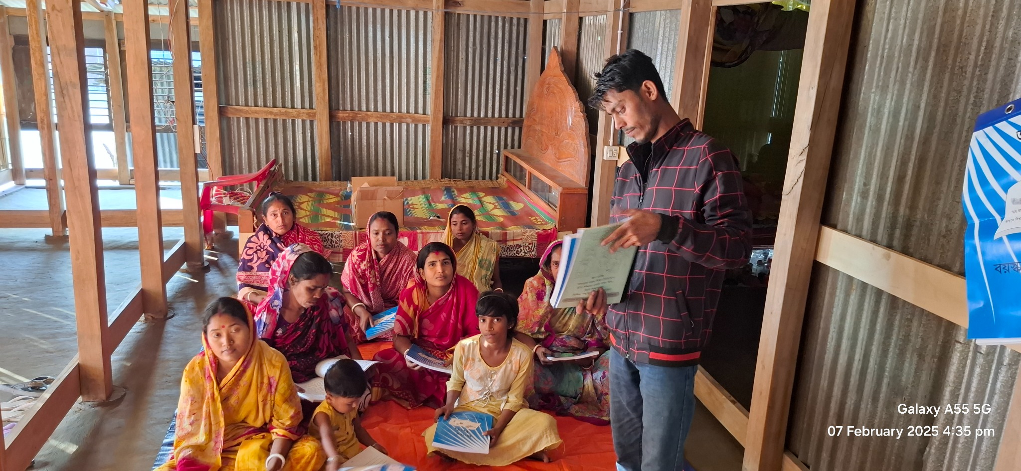 Women and children gathered for a learning and fellowship session